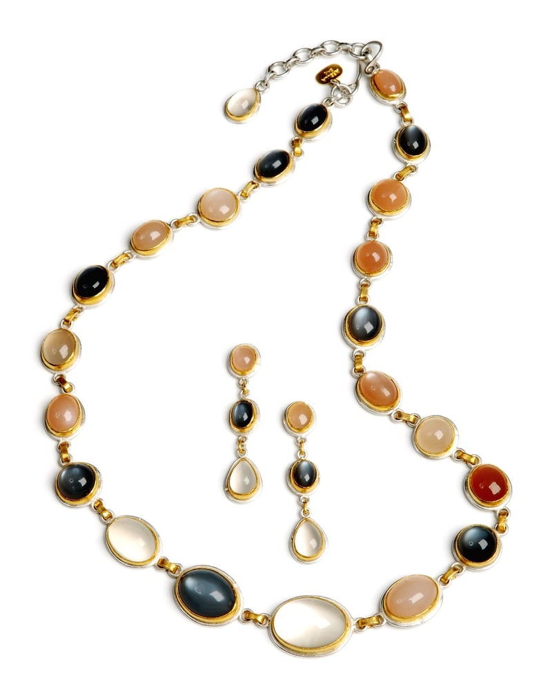 Earrings converted into a brooch